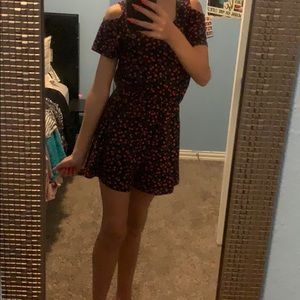 A red and black romper.